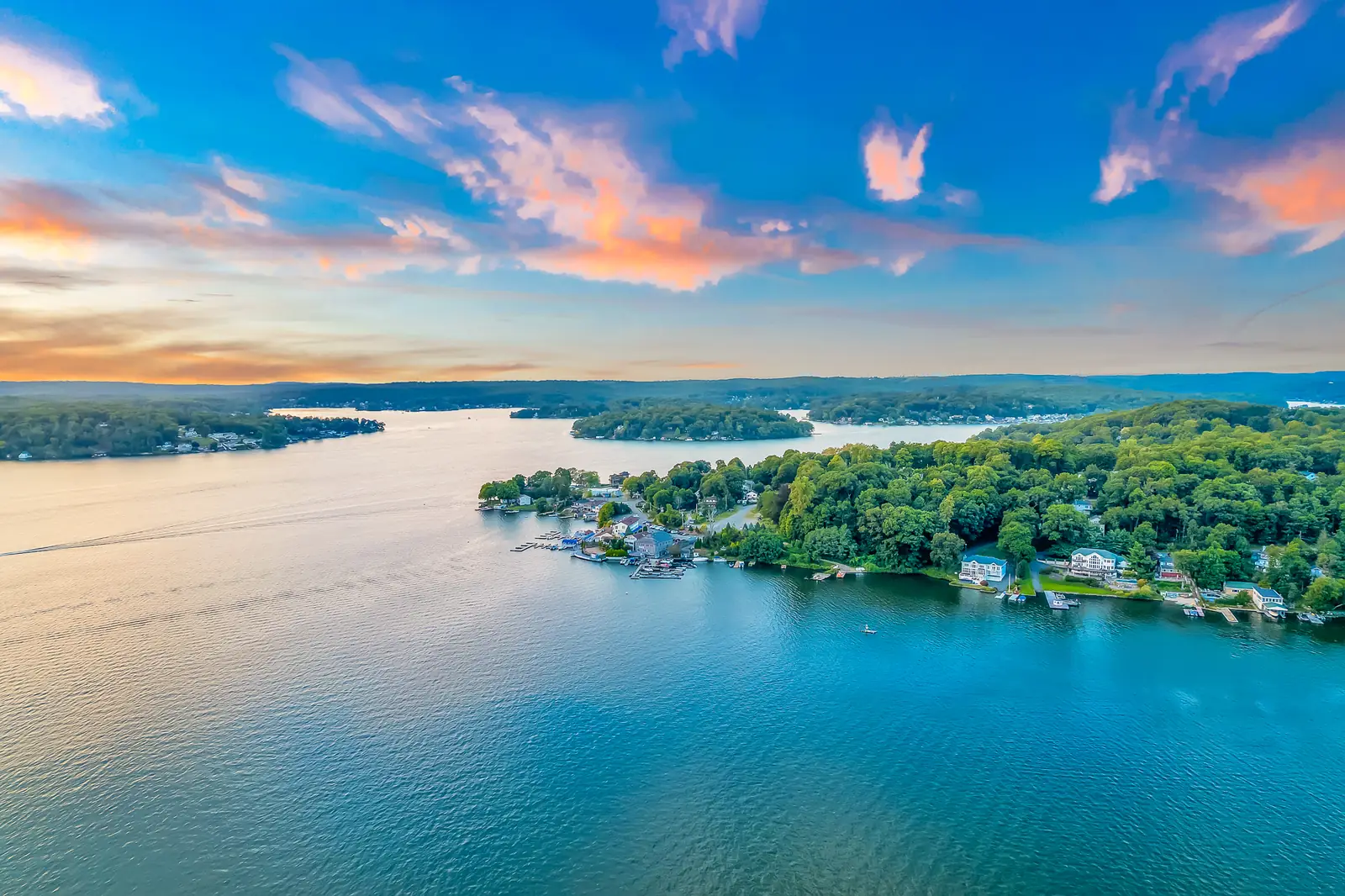 Lake Hopatcong from the air, a wooded point and islands running out into the water