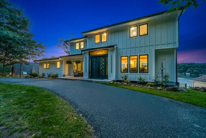 The house from the drive, the lake showing to the right